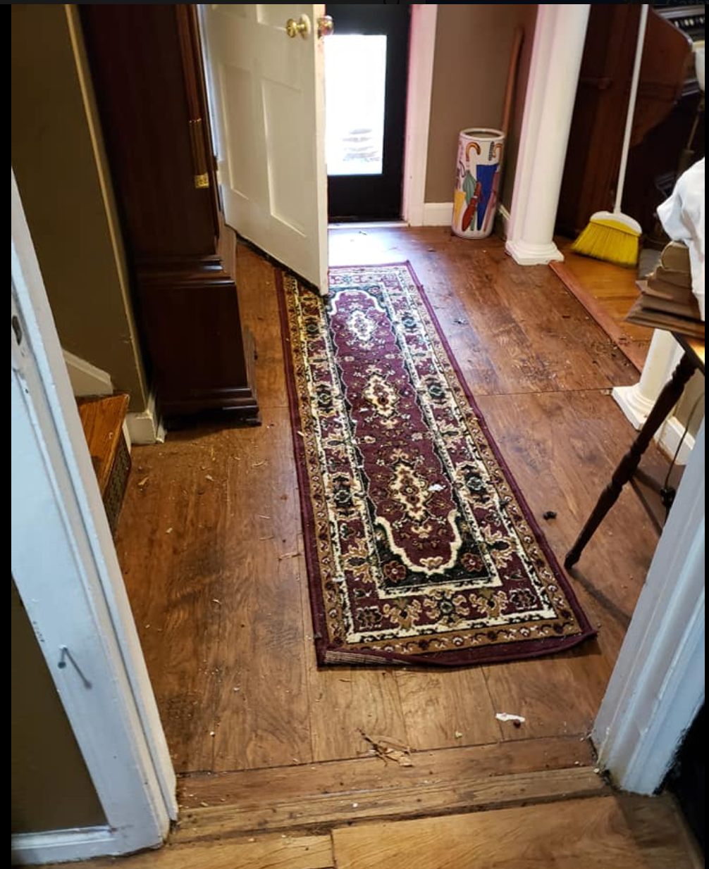 Before: Entryway & Hardwood Floors